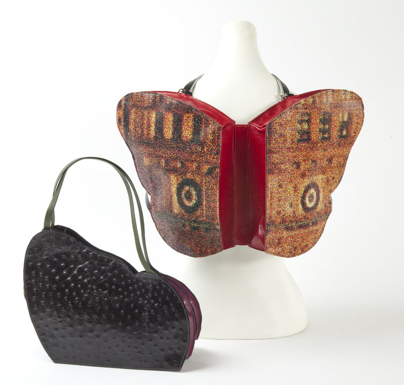 Open as backpack  in recycled vinyl billboard with upcycled conveyor belting cutoffs straps. Closed as handbag  shown in leather. Wings- if you can't earn them  buy them.