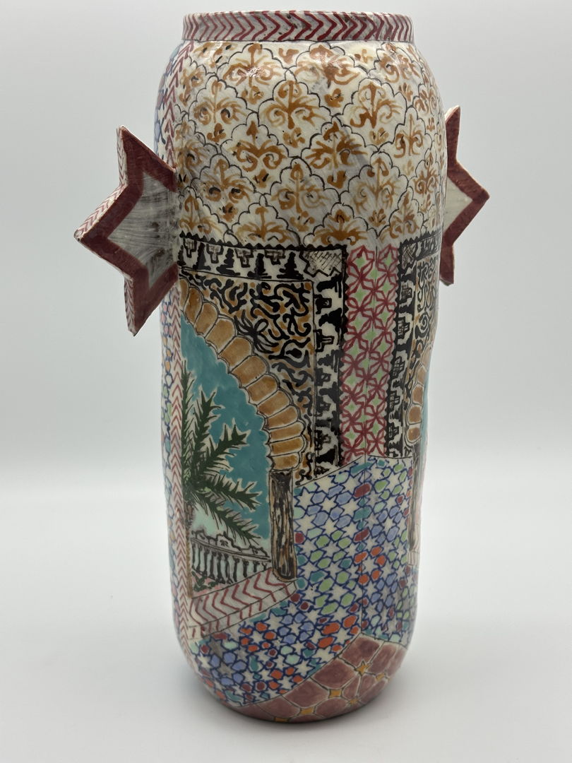 Hand painted  wheel thrown vase with various patterns  inspired by an archway scene from the Al-Hambra Palace in Spain.