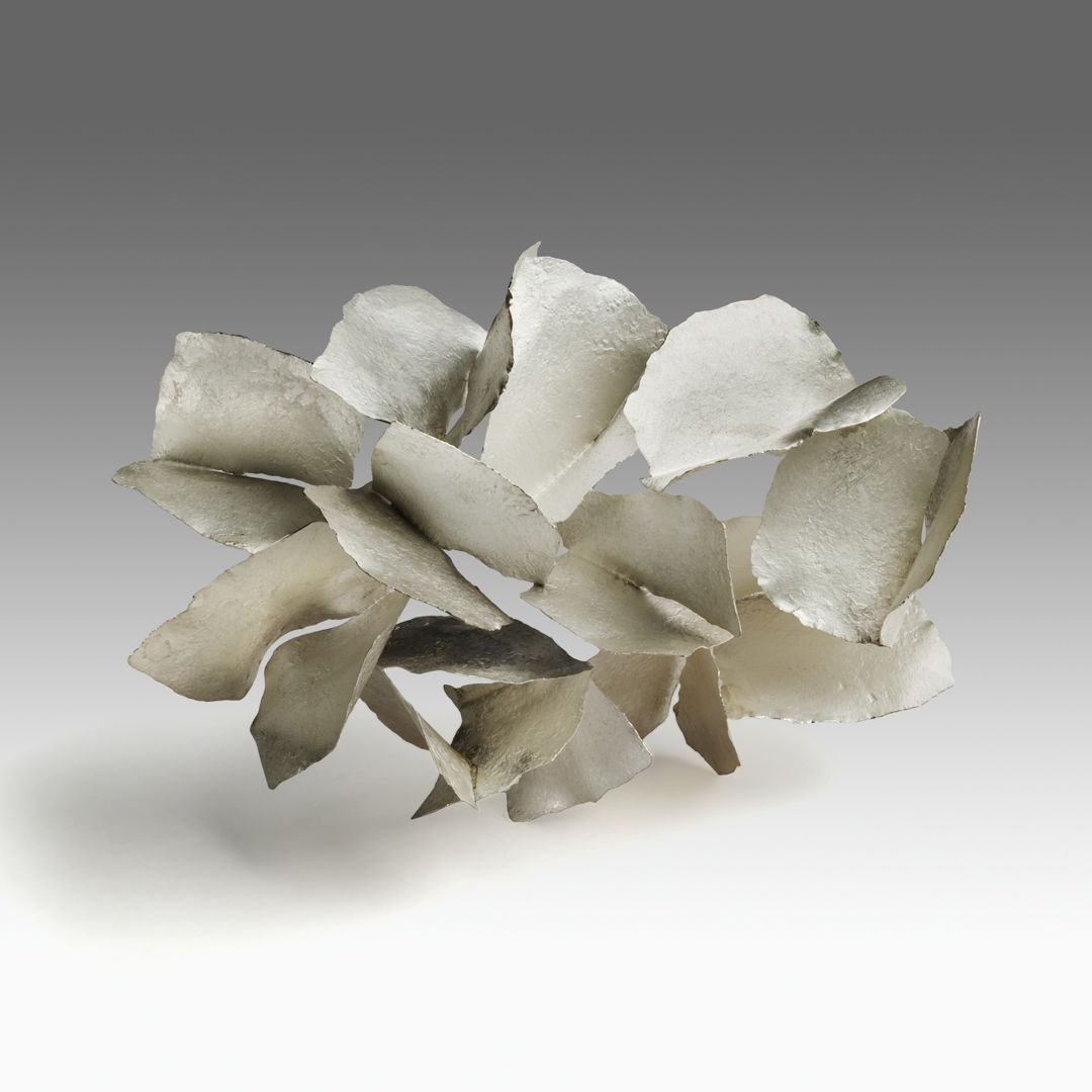 Brooch. Made with sterling silver. Hammered constructed.