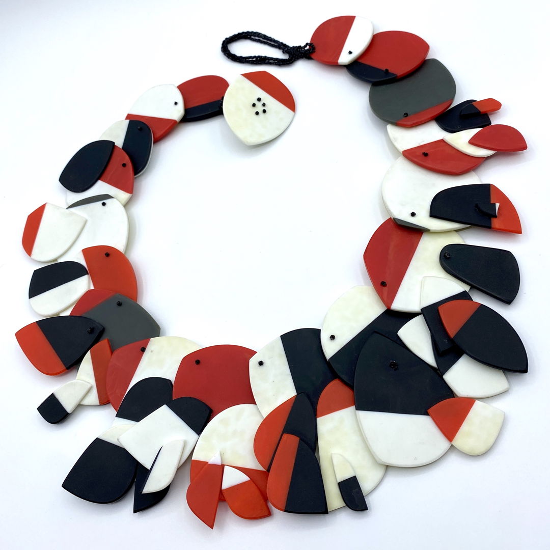 Fused  carved  and sewn glass with glass seed beads