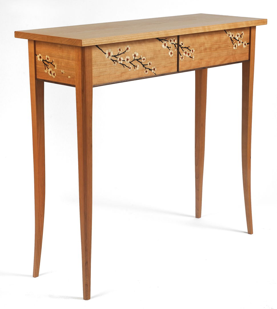 hall table featuring cherry blossom veneer marquetry.