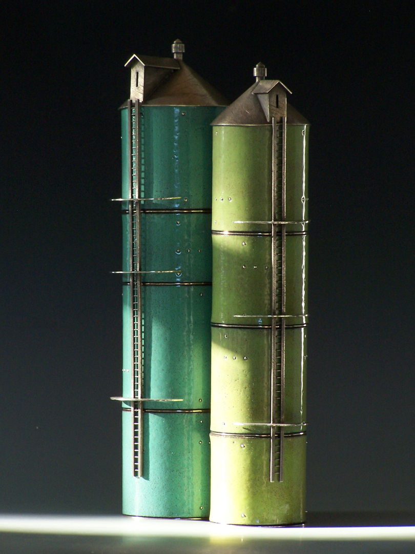 Fabricated object of sterling silver and traditional  kiln-fired enamel on copper. One-person studio  no casting.