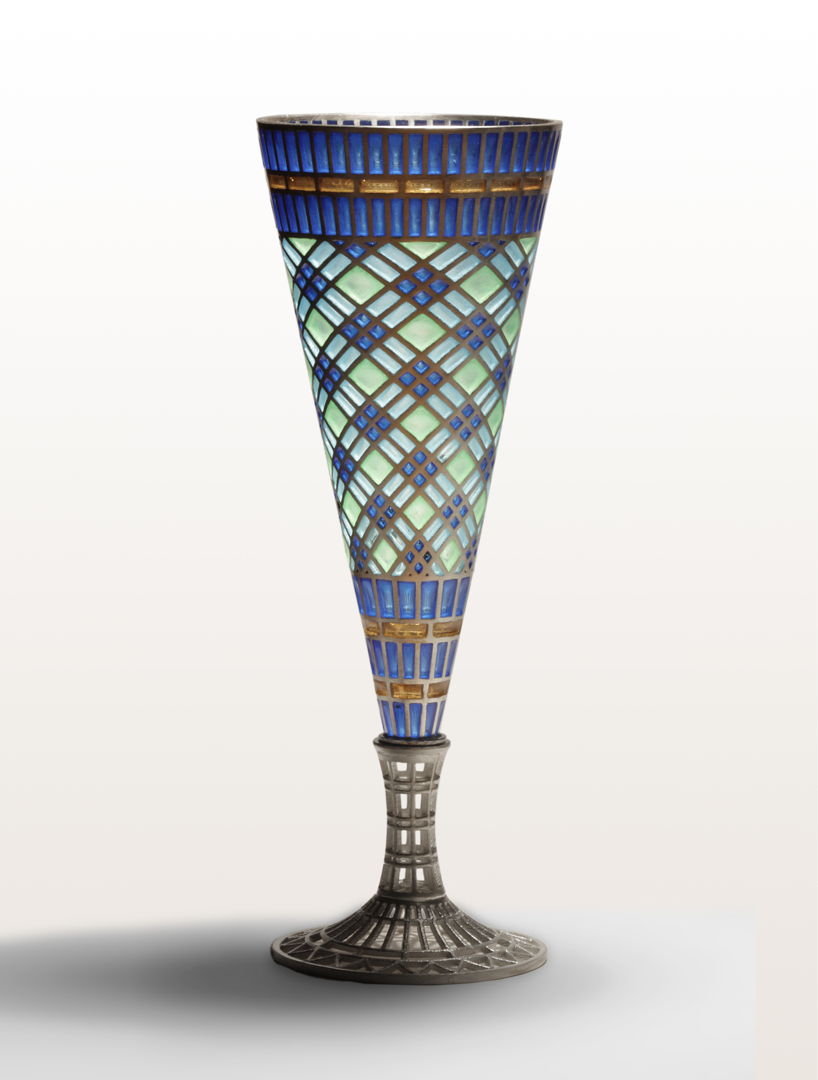 Plique a jour goblet -- When firing the enamel in the furnace  only surface tension keeps the molten glass in place. The result is like a 3D stained glass window.