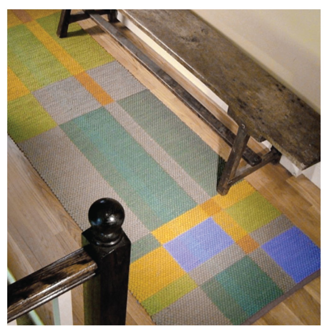 Contemporary rag rug handwoven with 100% cotton yarn and fabric strips using the Double Weave technique