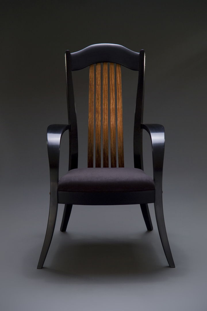dark Occasional chair  with lighter back slats and dark upholstered seat.
