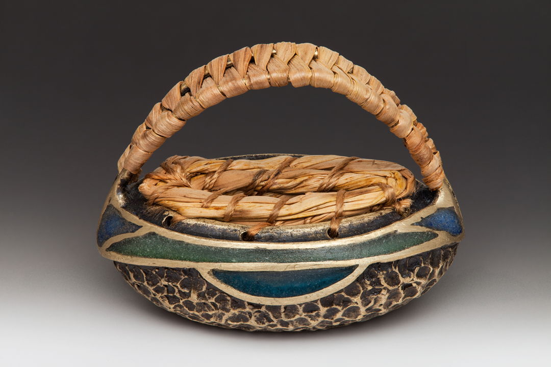 Cast bronze basket from coiled and woven sweet grass