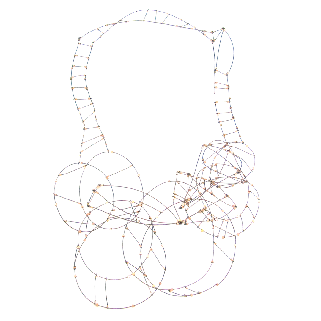 From 2D to 3D  intersecting mobius strips and pyramids constructed from nylon-coated stainless steel and 14k gold fill tubing as connectors. The piece is volumetric when you hold it up but conforms to the body when worn.