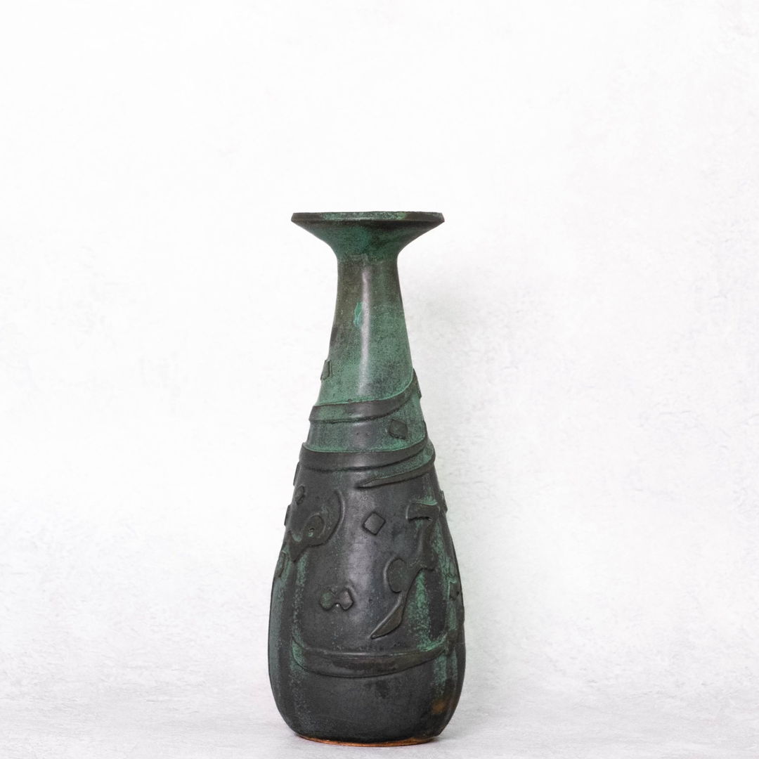 skinny vase with glaze similar to bronze patina and inscription