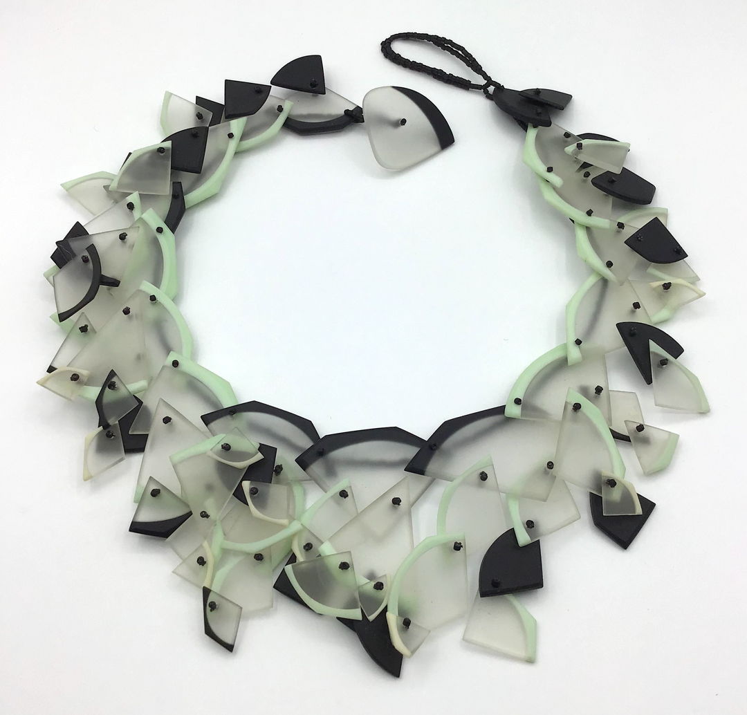 Blown  carved  and sewn glass with glass seed beads