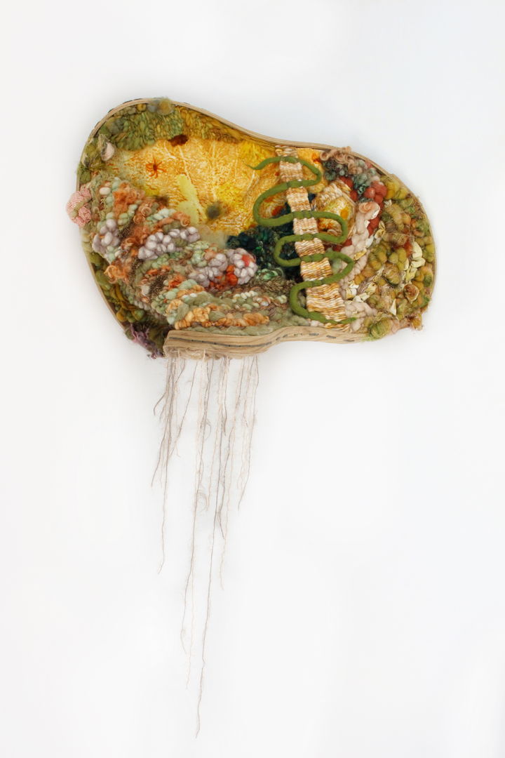 The bent wood frame pushes the work off the wall to create crevices and pockets  a play of what we can see and what is hidden. The yarn builds up texture and is playing off the botanically dyed cloth in the background to reference landscape.