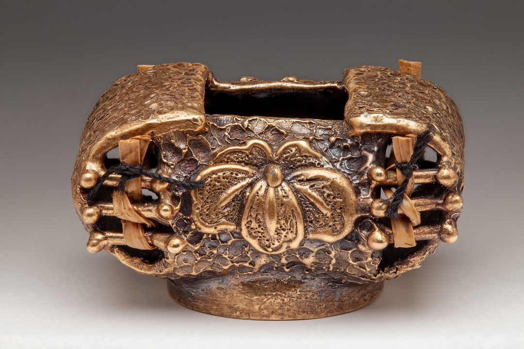 Cast basket with twined sweet grass and silk