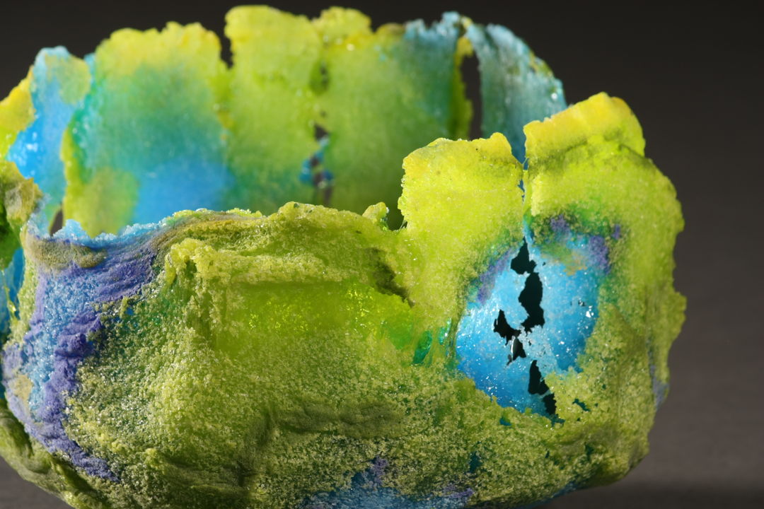 Detail image of distressed pate de verre glass casting.