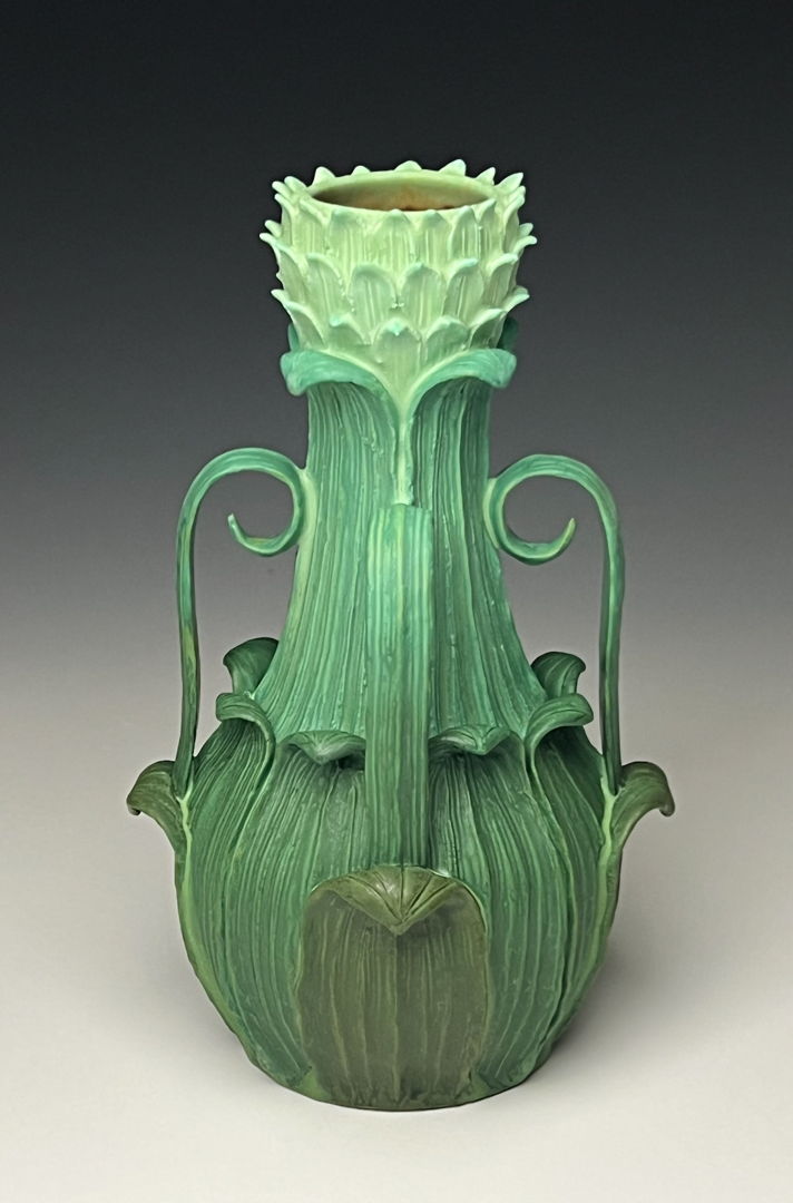 plant-like earthenware clay vase.