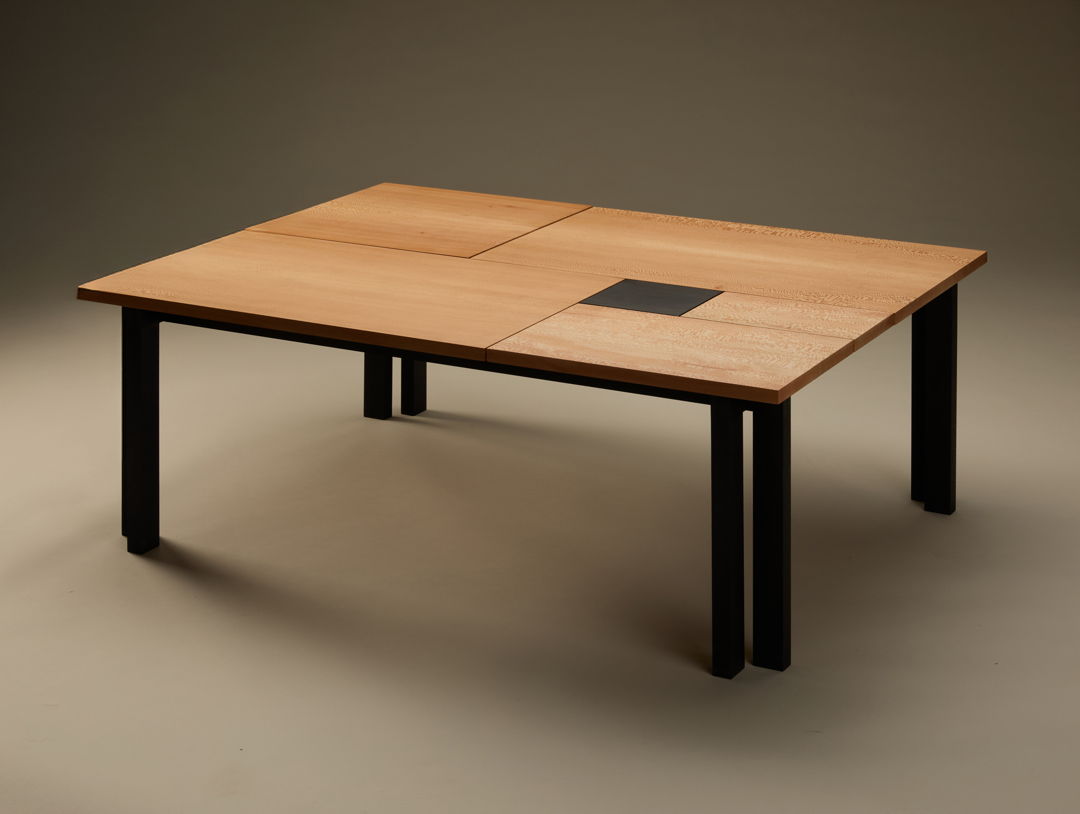 Golden rectangles and squares of quartersawn and bookmatched American sycamore surround a black square in a one-of-a-kind coffee table. The pieces are separated by 1/8 inch and float on a nearly invisible frame. Eight ebonized beech legs are proportioned by the golden ratio.