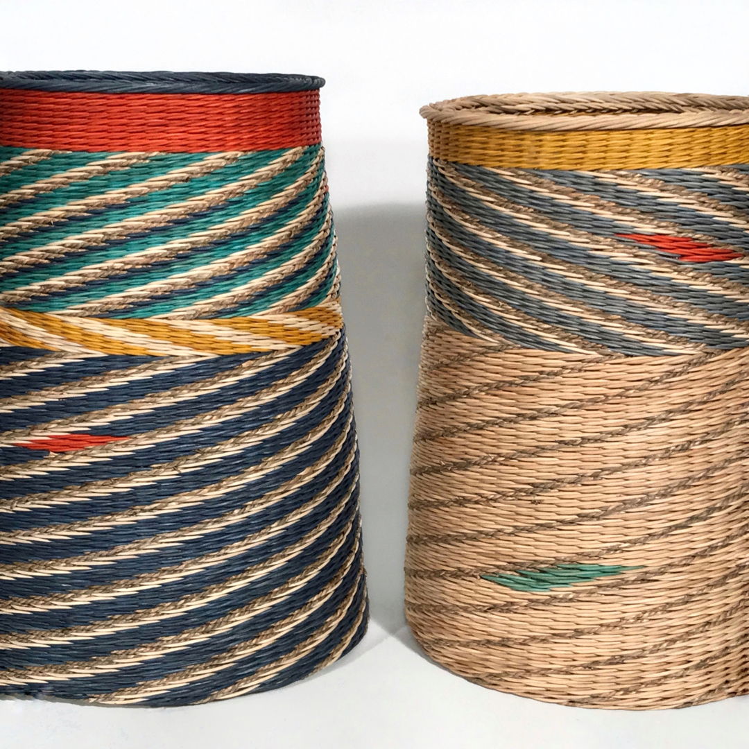 Two multicolored rattan baskets with diagonals.