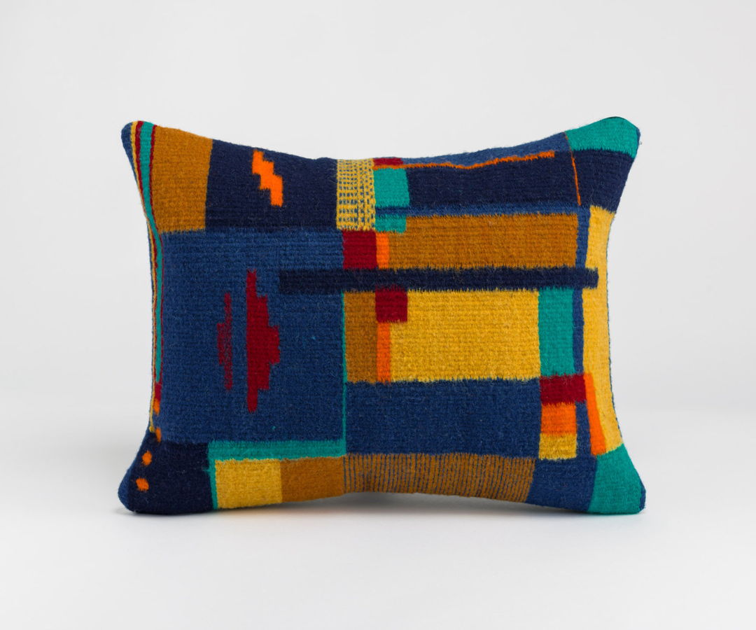 HANDWOVEN PILLOWCASE SIGNED WITH FOUR DOTS.