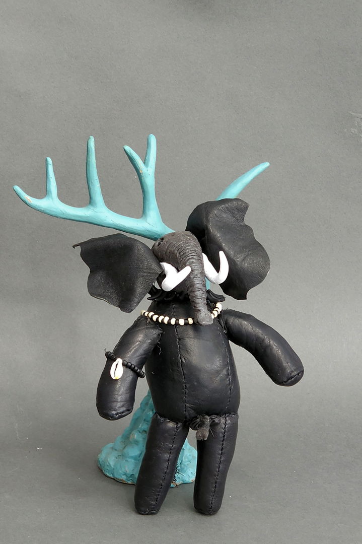 polymer clay  leather  cowry shell  glass beads