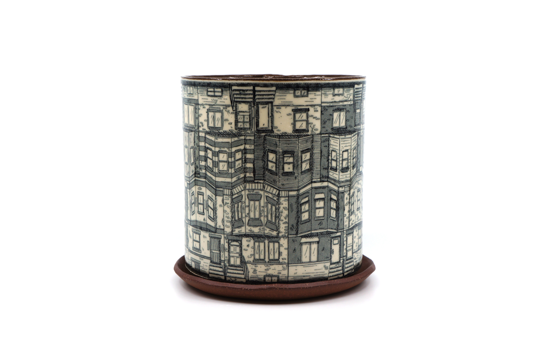 Pot with repeating pattern made up of rowhouses