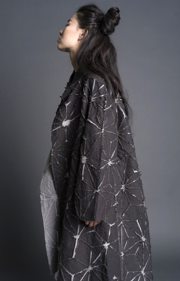 Hand-dyed using sustainable dyes  silk and linen. Deconstructed  hand-cut  stitched. Hand-patterned. Constructed with couture finishing by hand and machine. Worn with Urban Shirt.