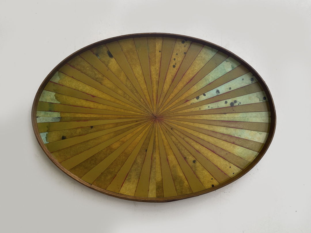 oval object  paper  wood  paint  dye  shellac  varnish