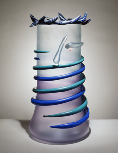 Glass vase with blue glass tendril spiraling downwards