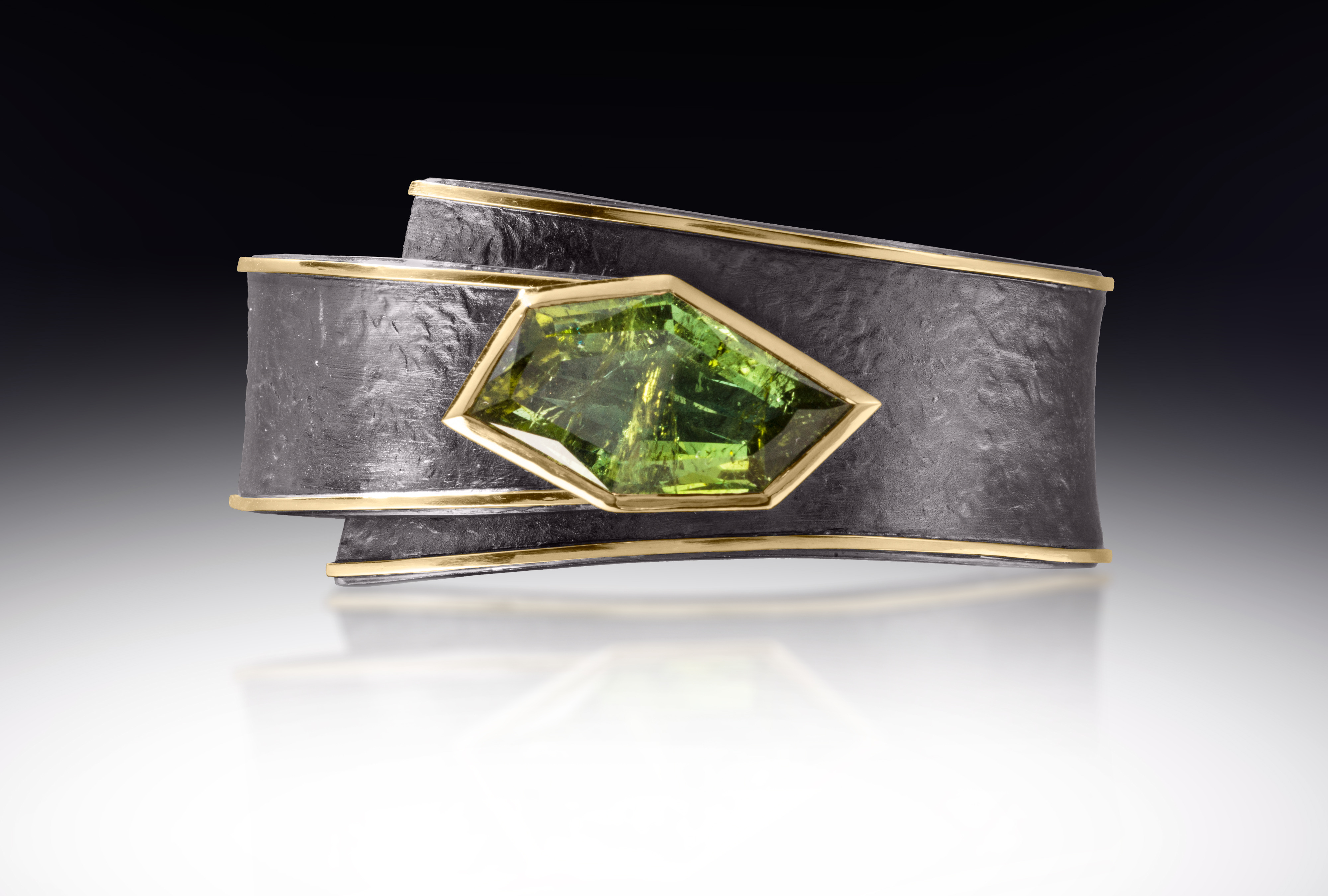 cuff with green stone