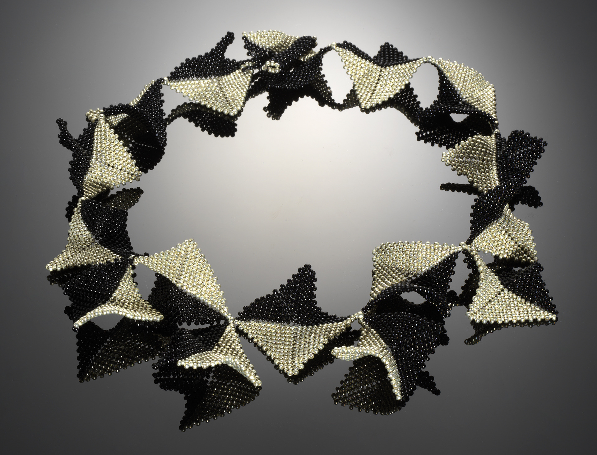 necklace with beaded black and white triangles