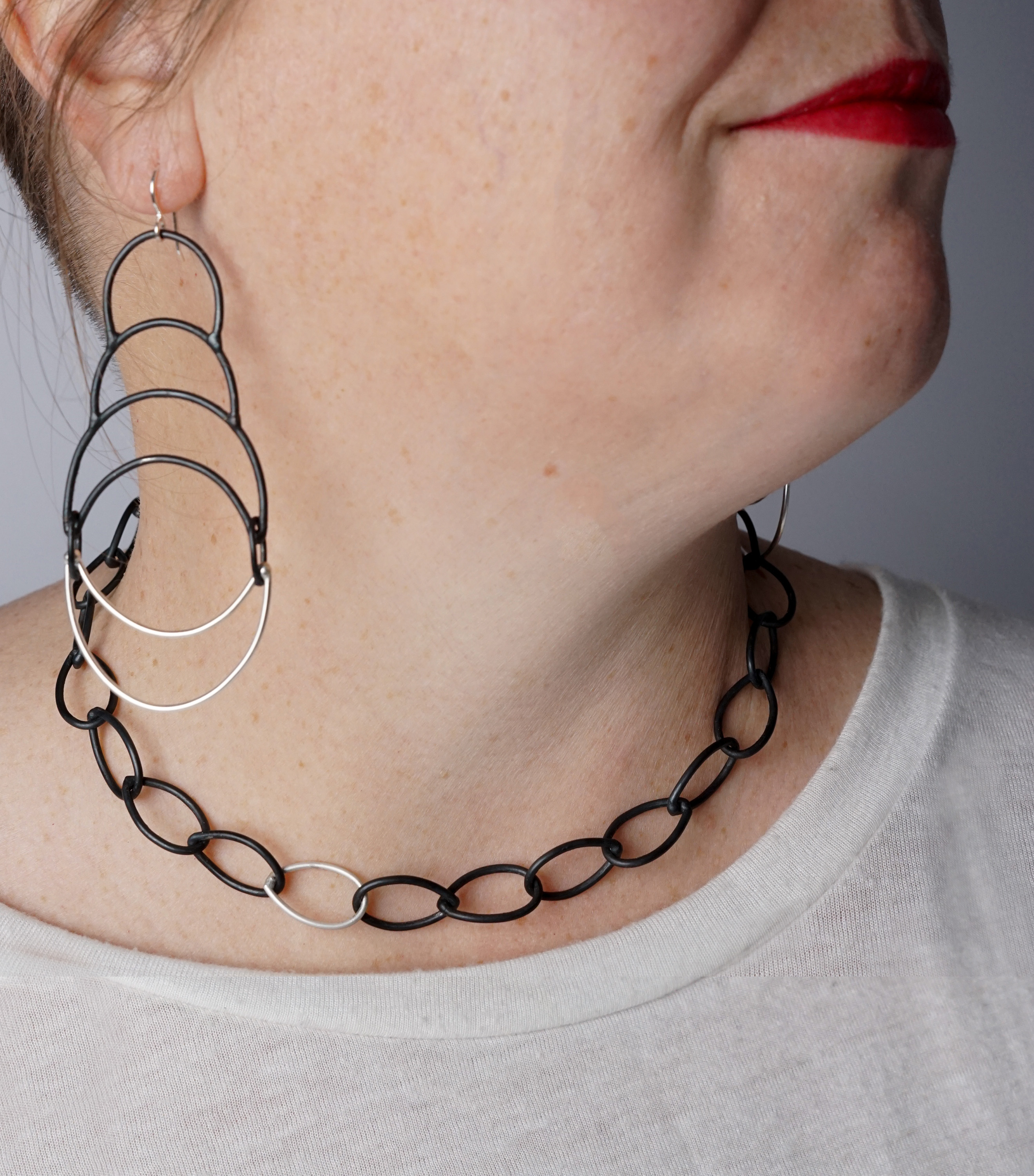 wire earrings with cascading and nested cresent shapes