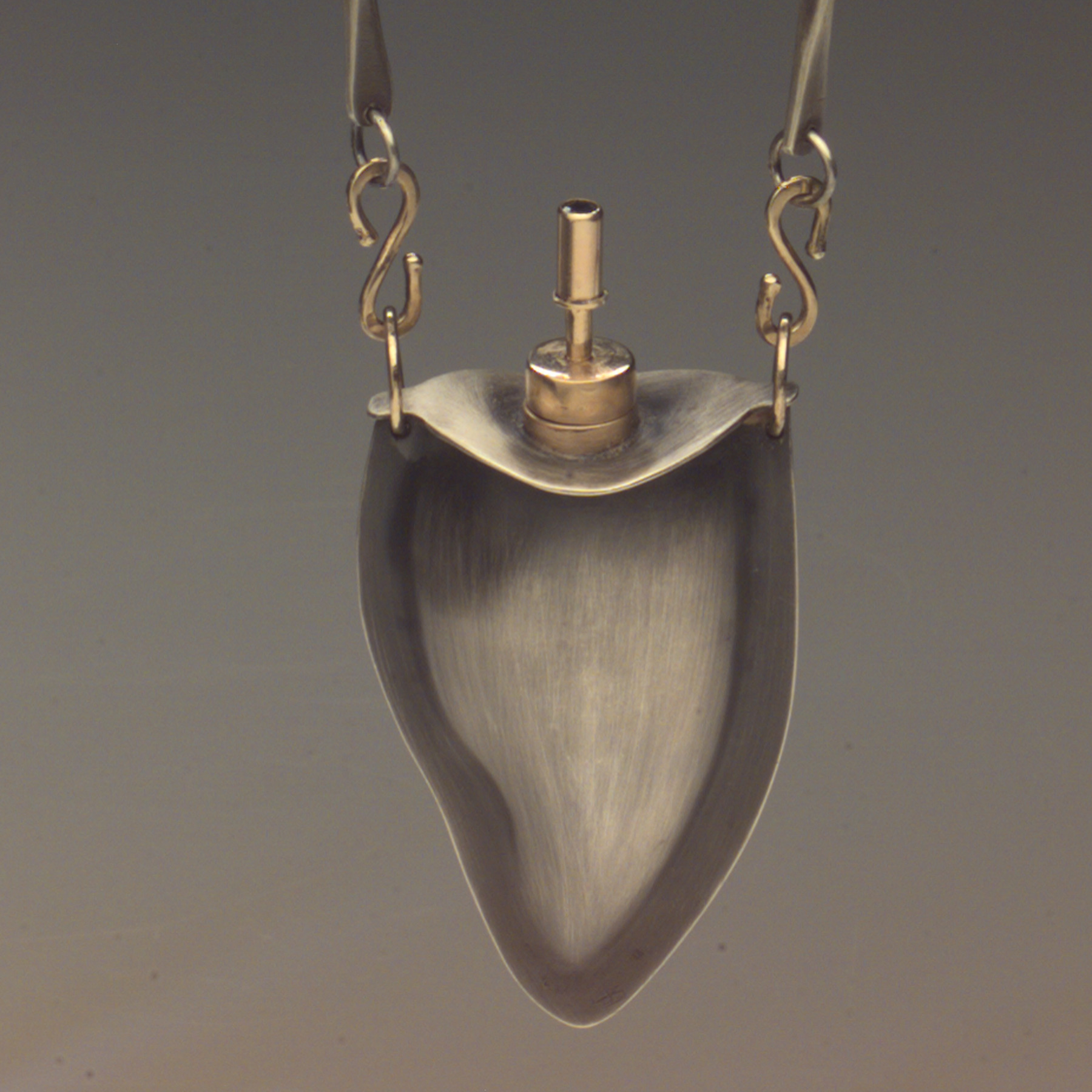 gold and silver charm