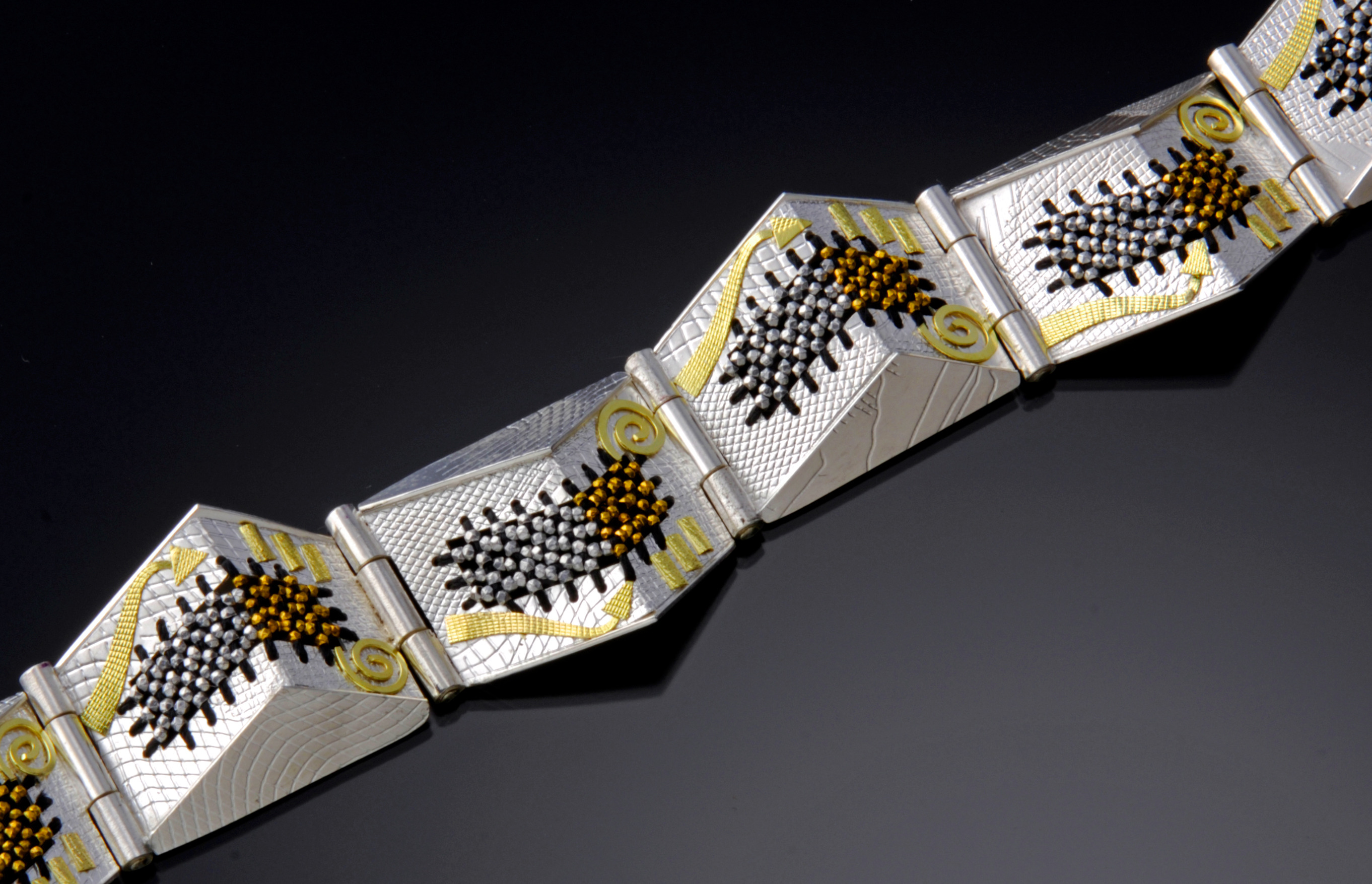 silver, gold, and rust jewelry