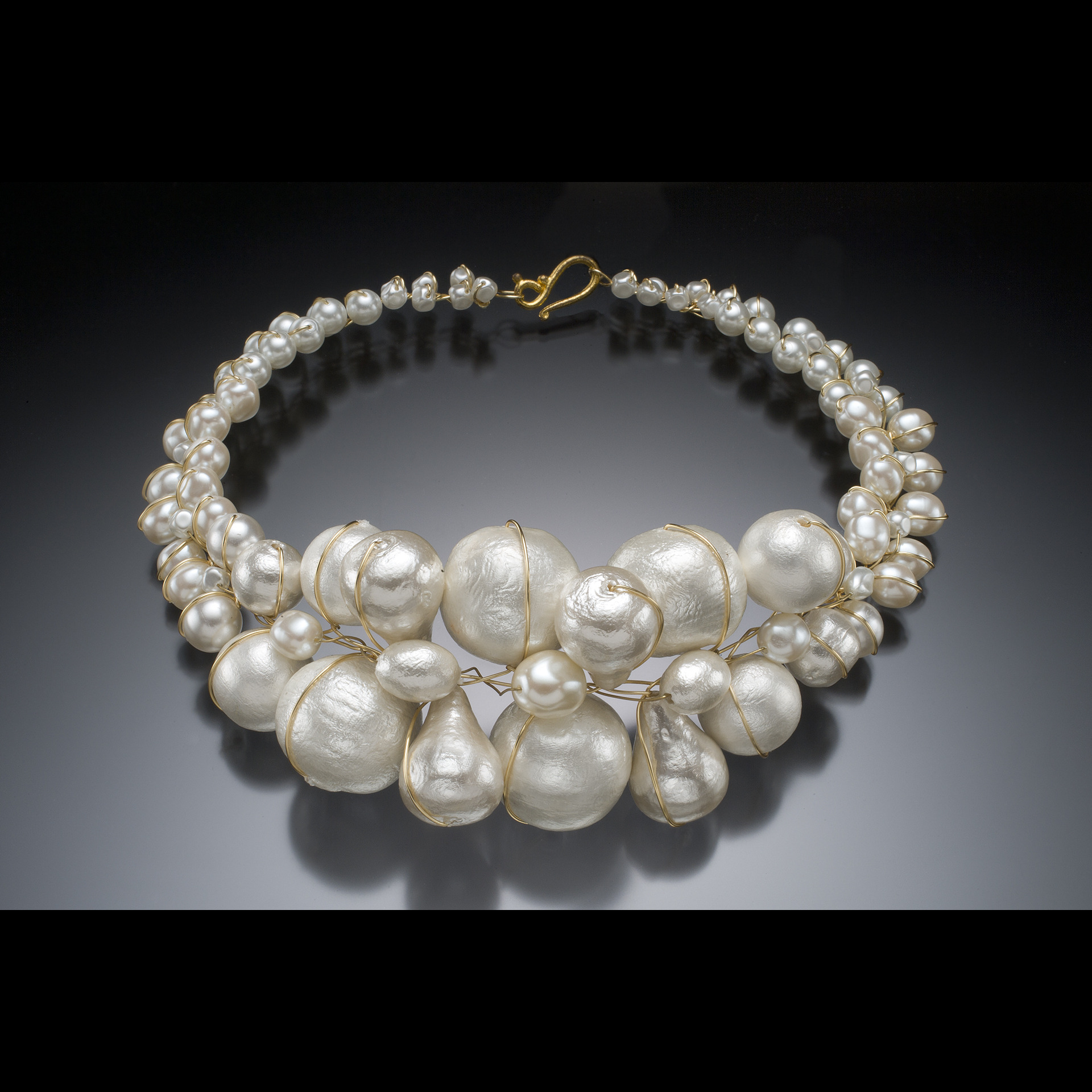 white and gold necklace
