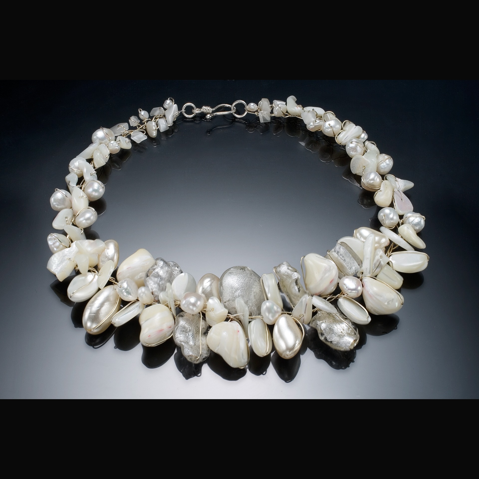 white and silver necklace