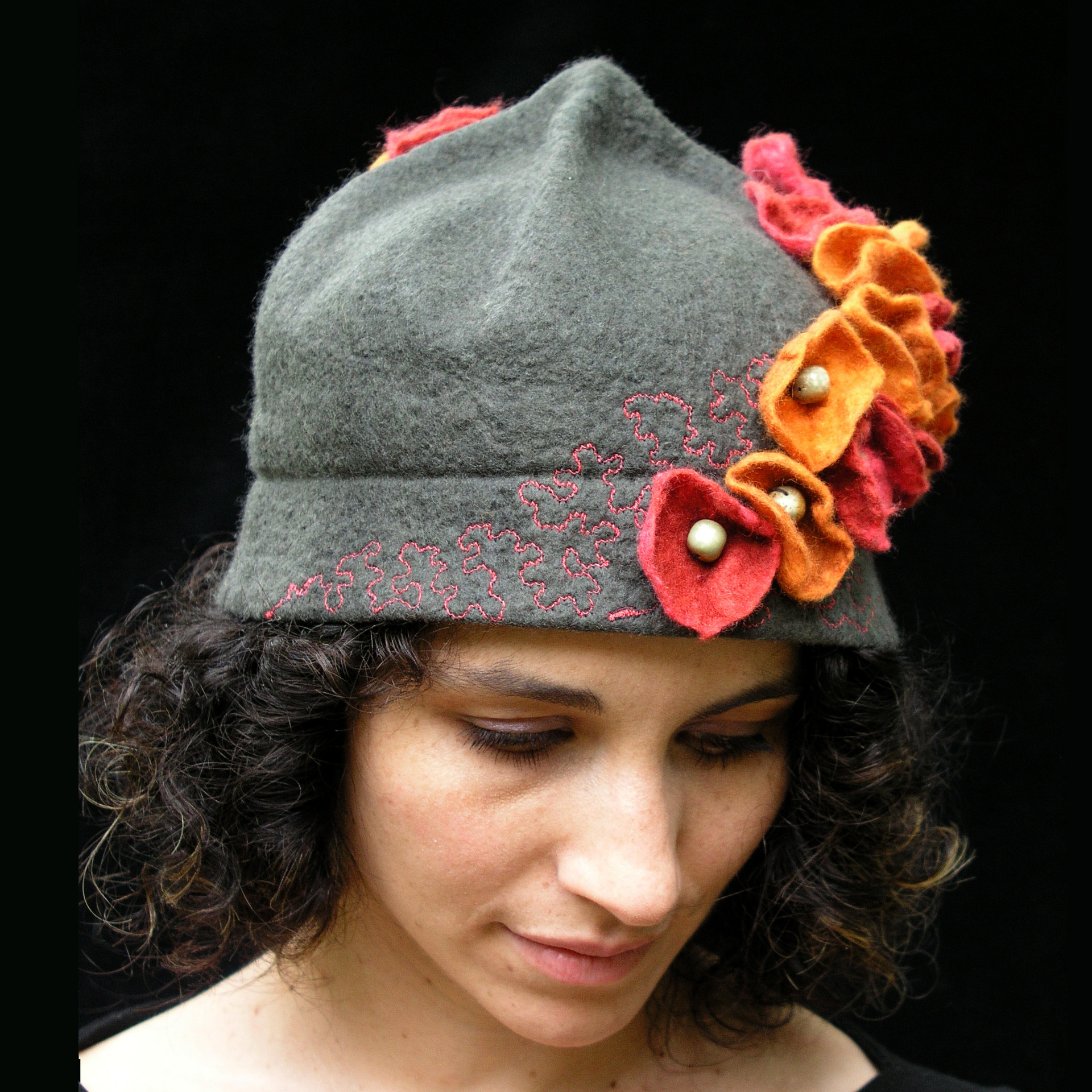 felted bucket hat with a cascade of flowers