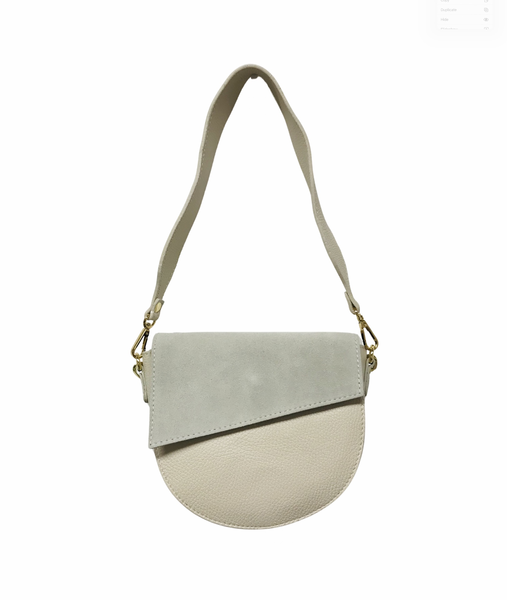white purse with fold over opening