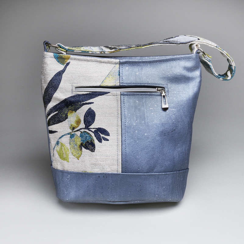 blue and white purse with branch pattern
