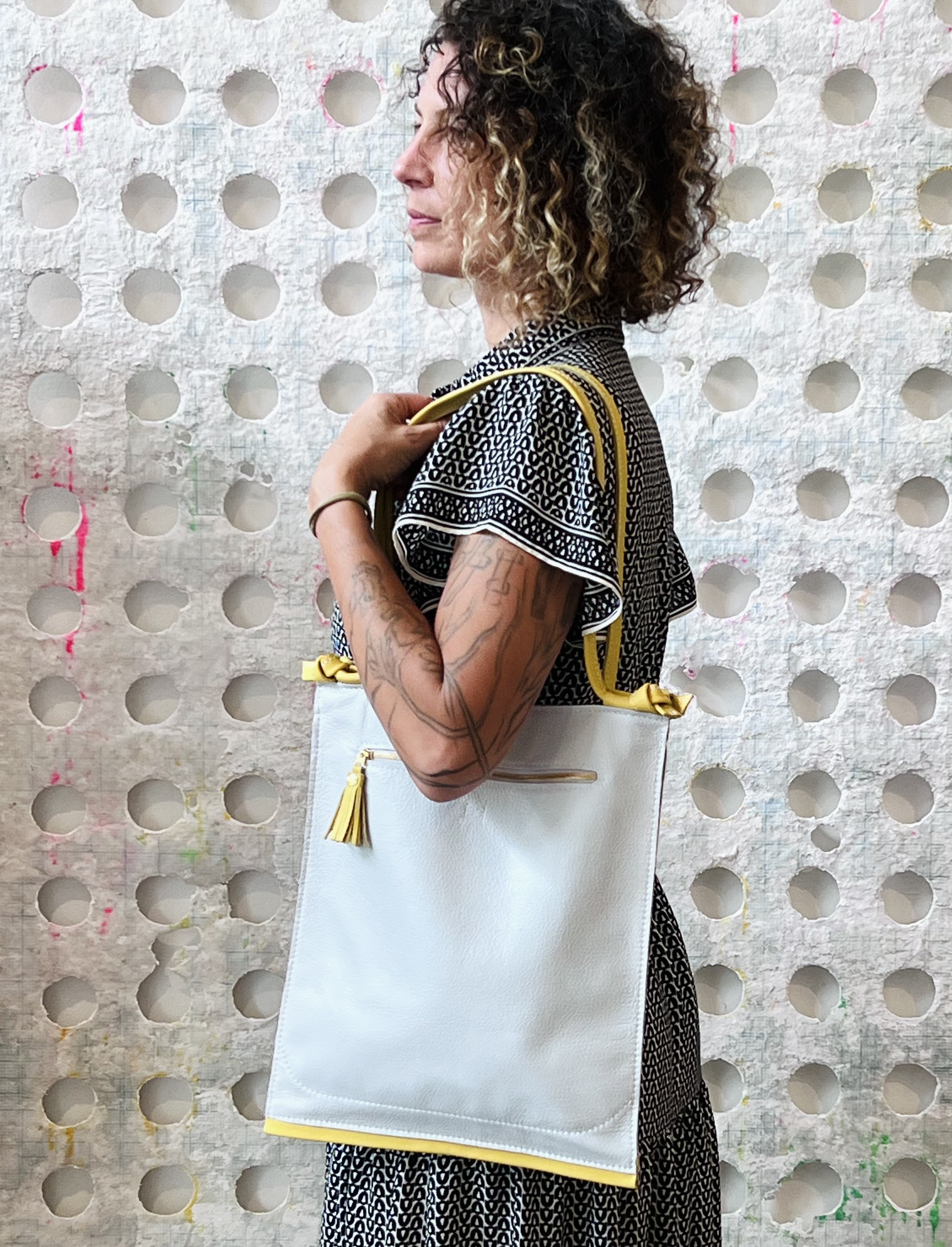 white tote bag with yellow accents