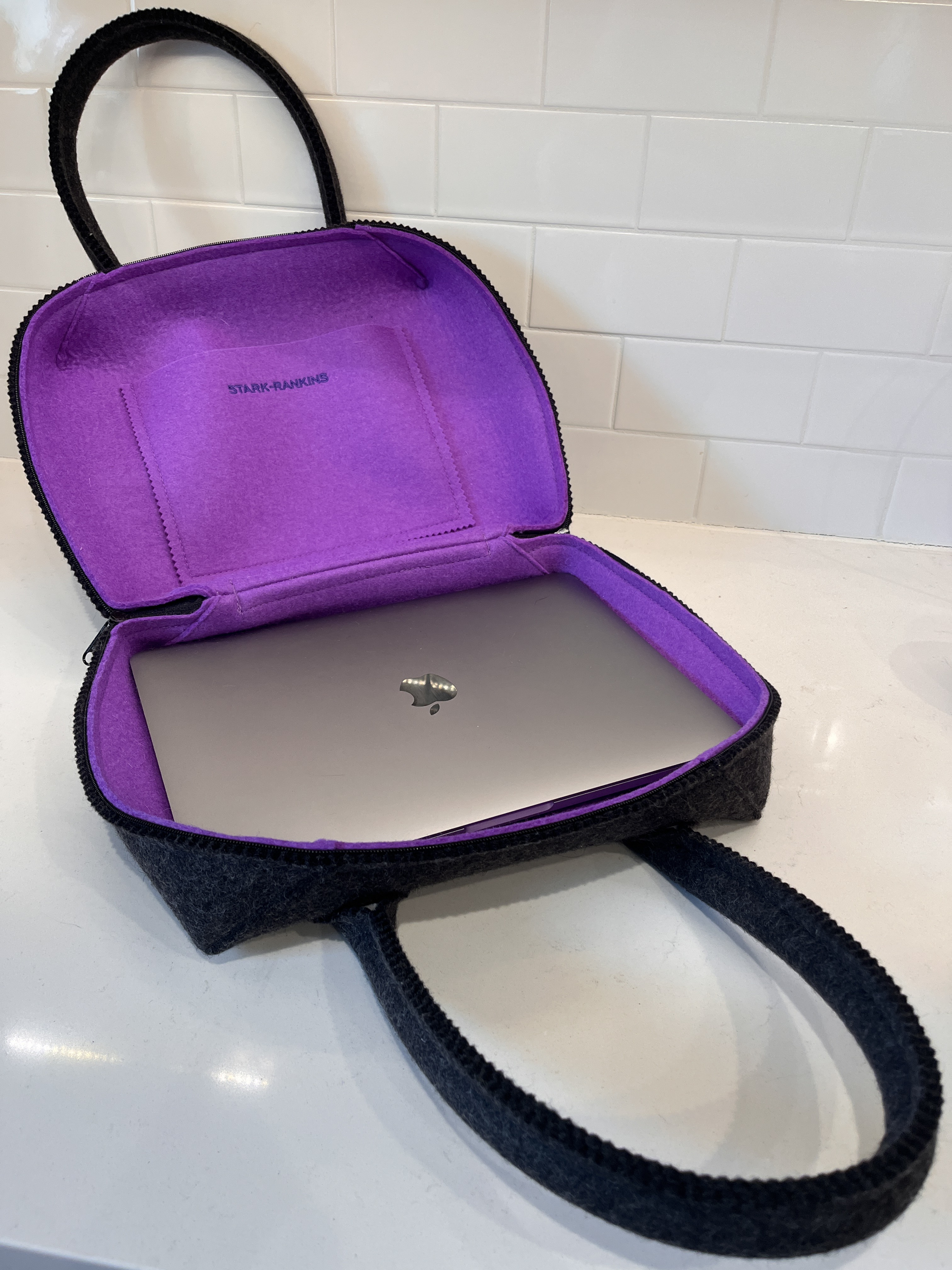 black and purple bag