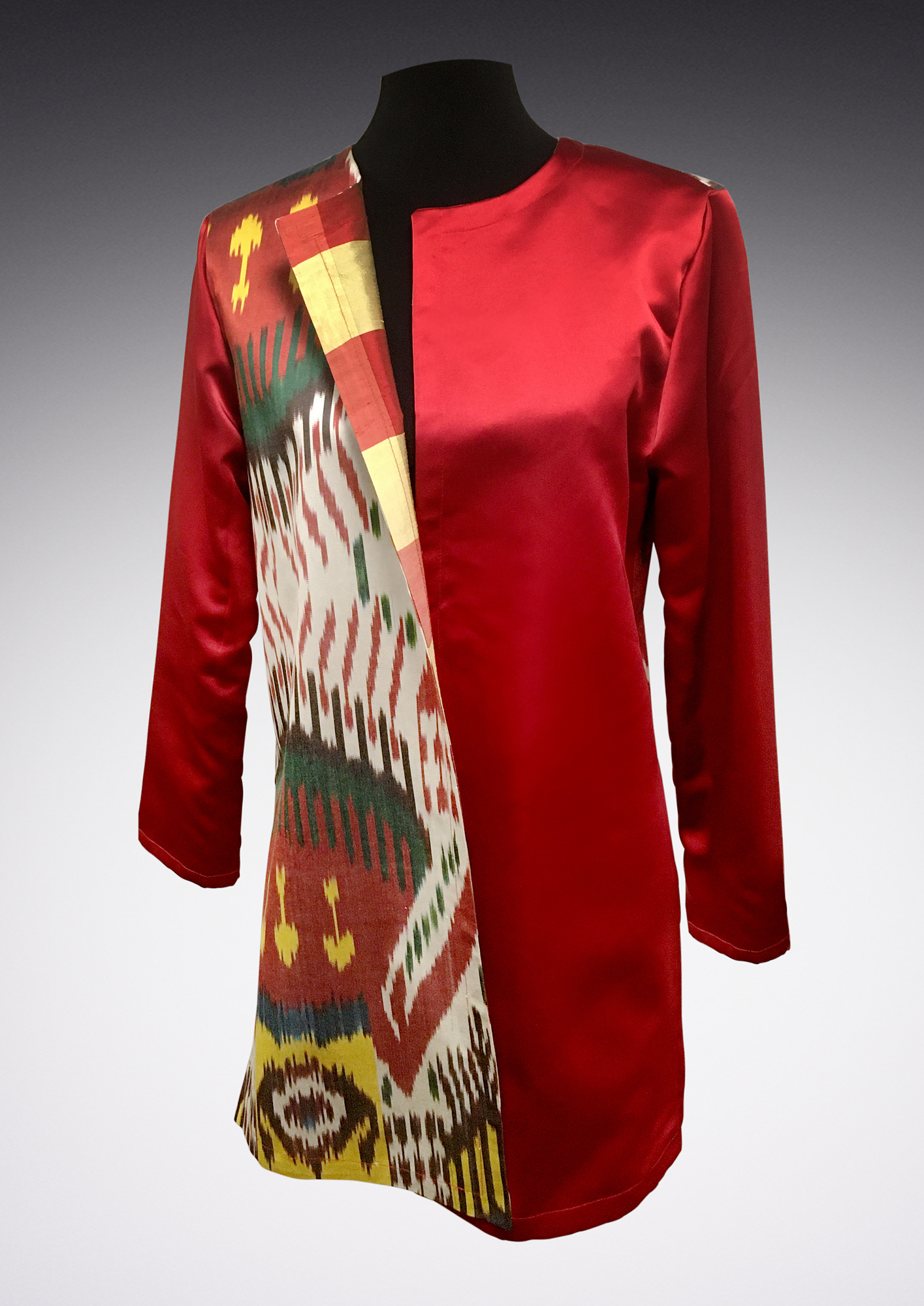 red jacket with one panel of bold pattern