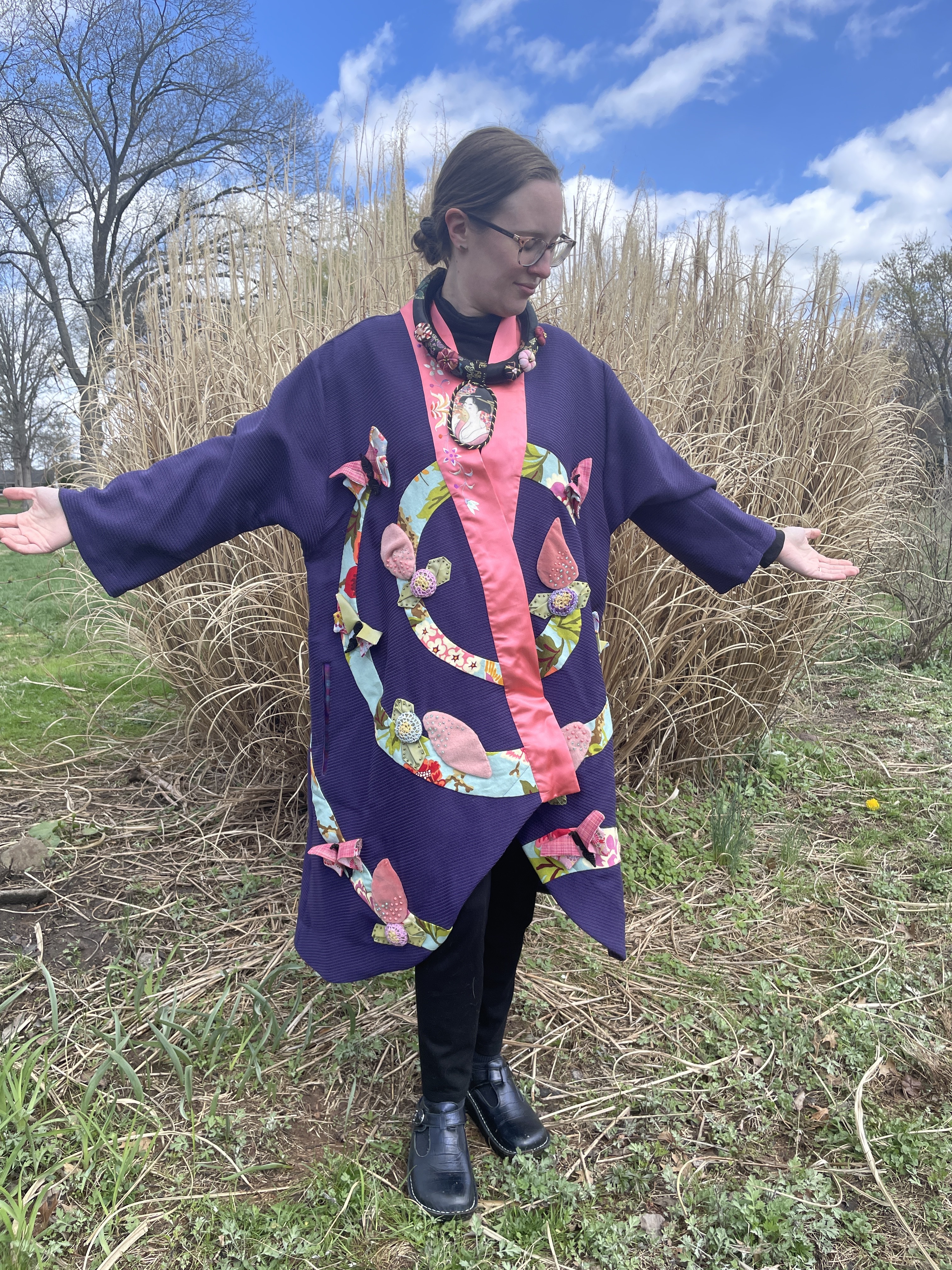 Long jacket with appliqued spiral