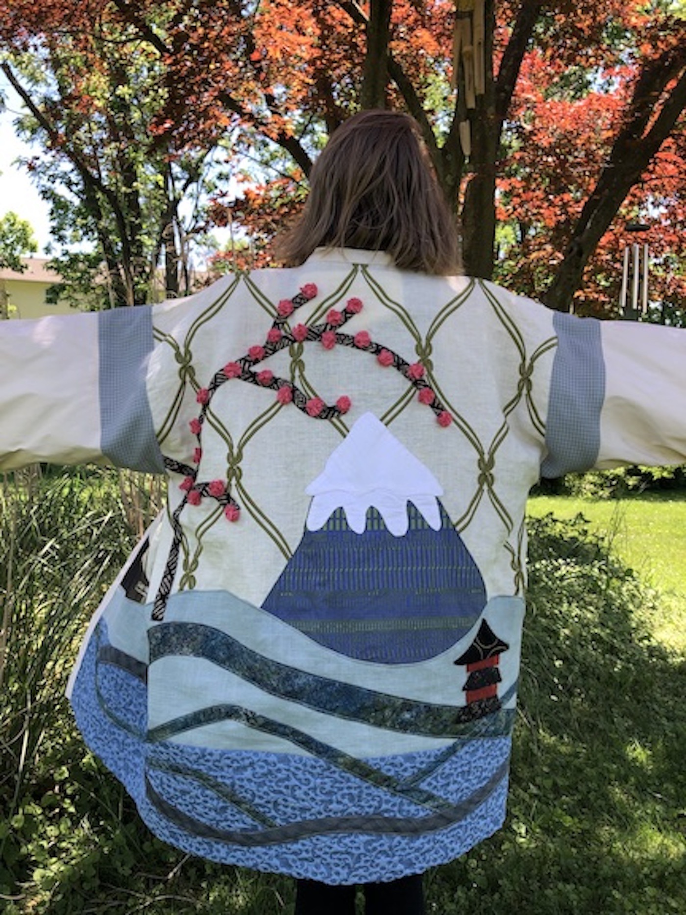jacket with mountain and cherry tree