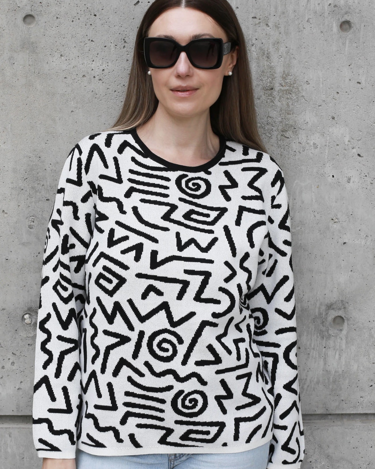 white and black sweater