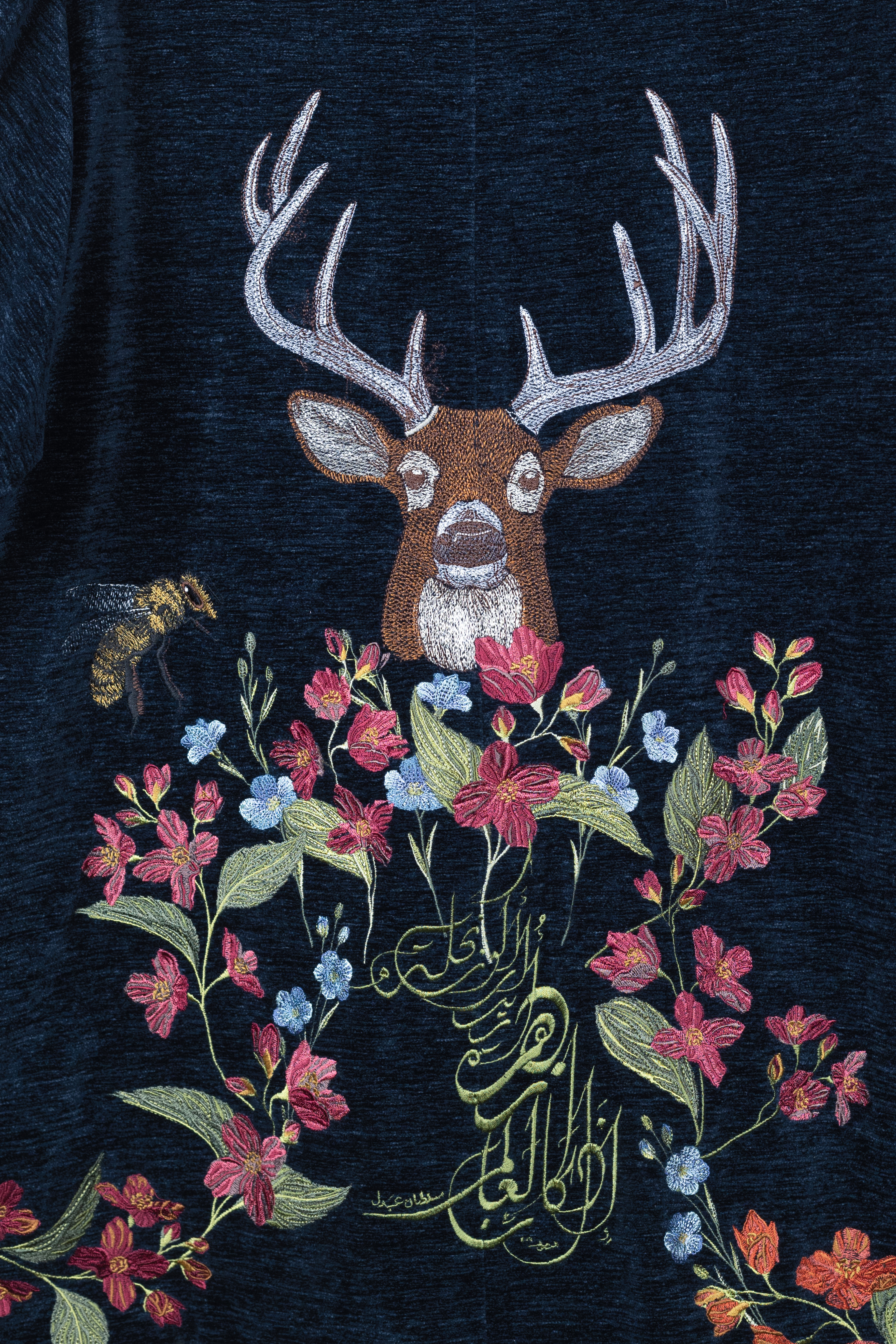 embroidered deer detail