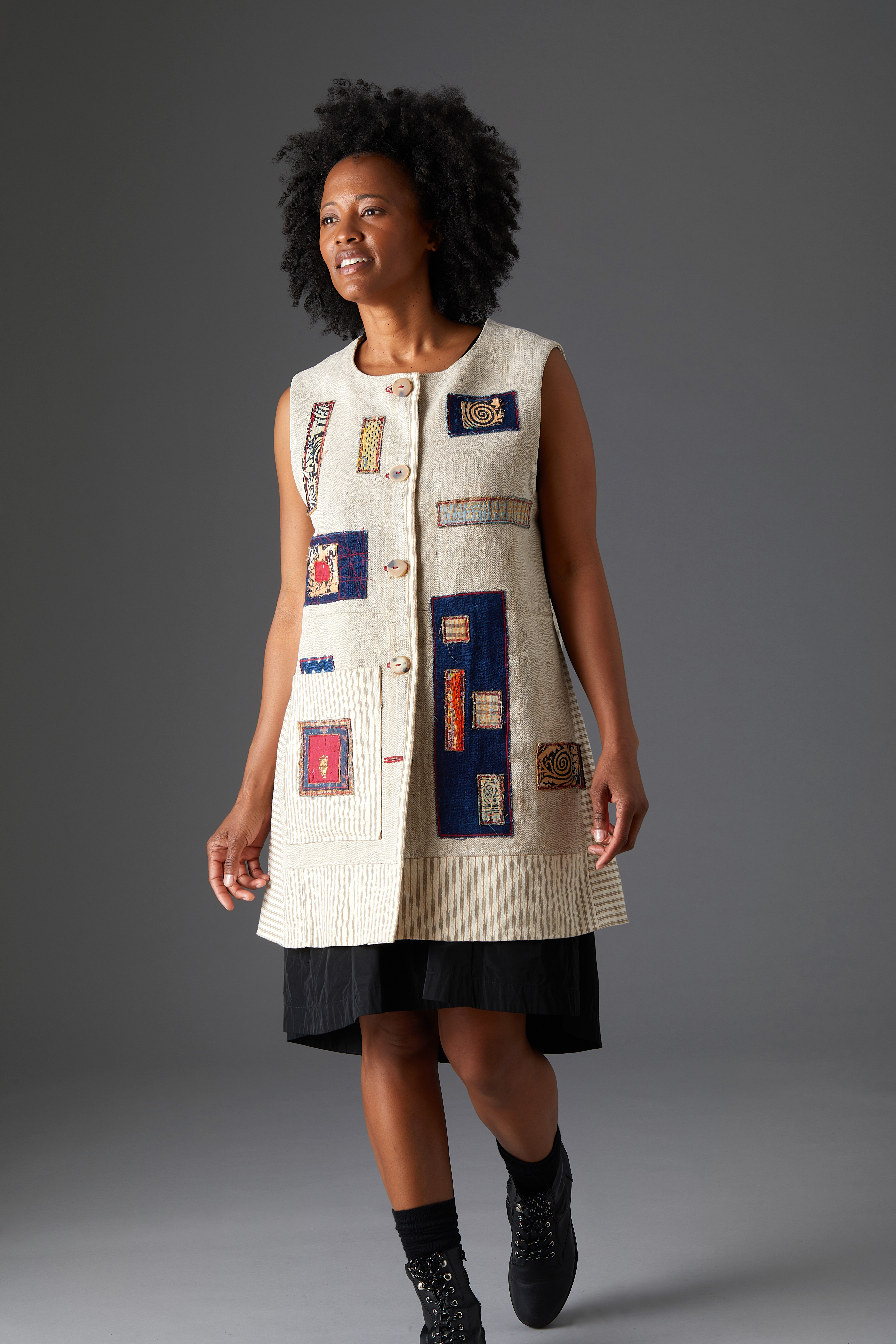 white sleeveless coat