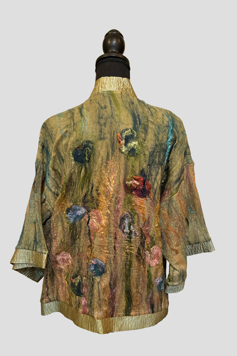 back of green and colorful jacket