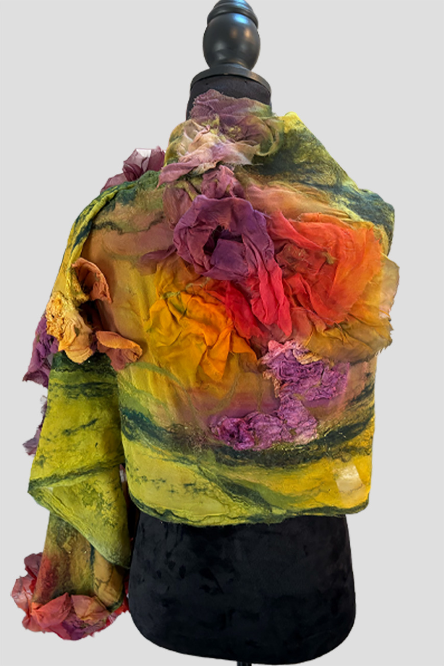 back of green and colorful scarf