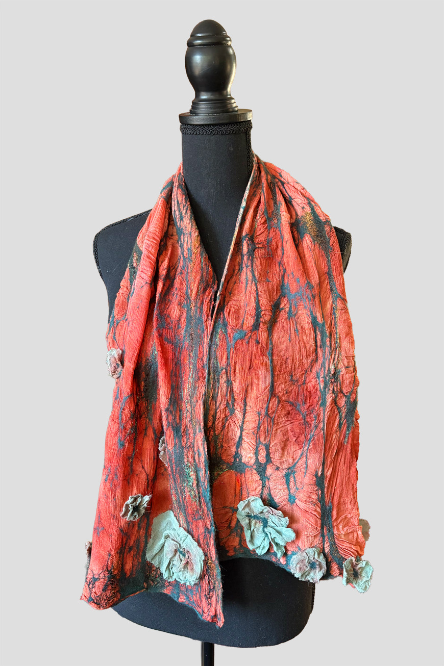 grey, peach, and blue scarf