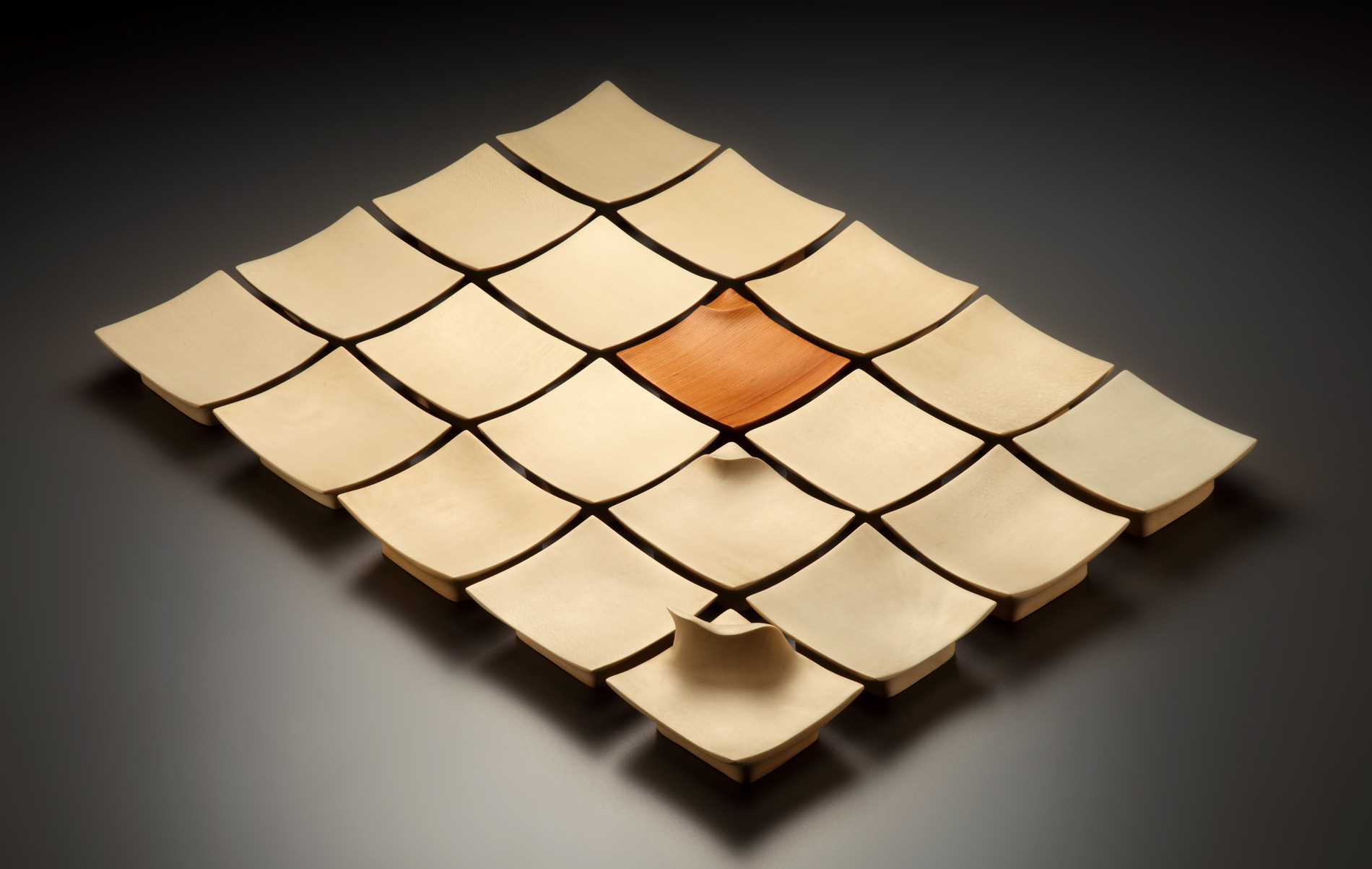 wooden sculpture made of several squares