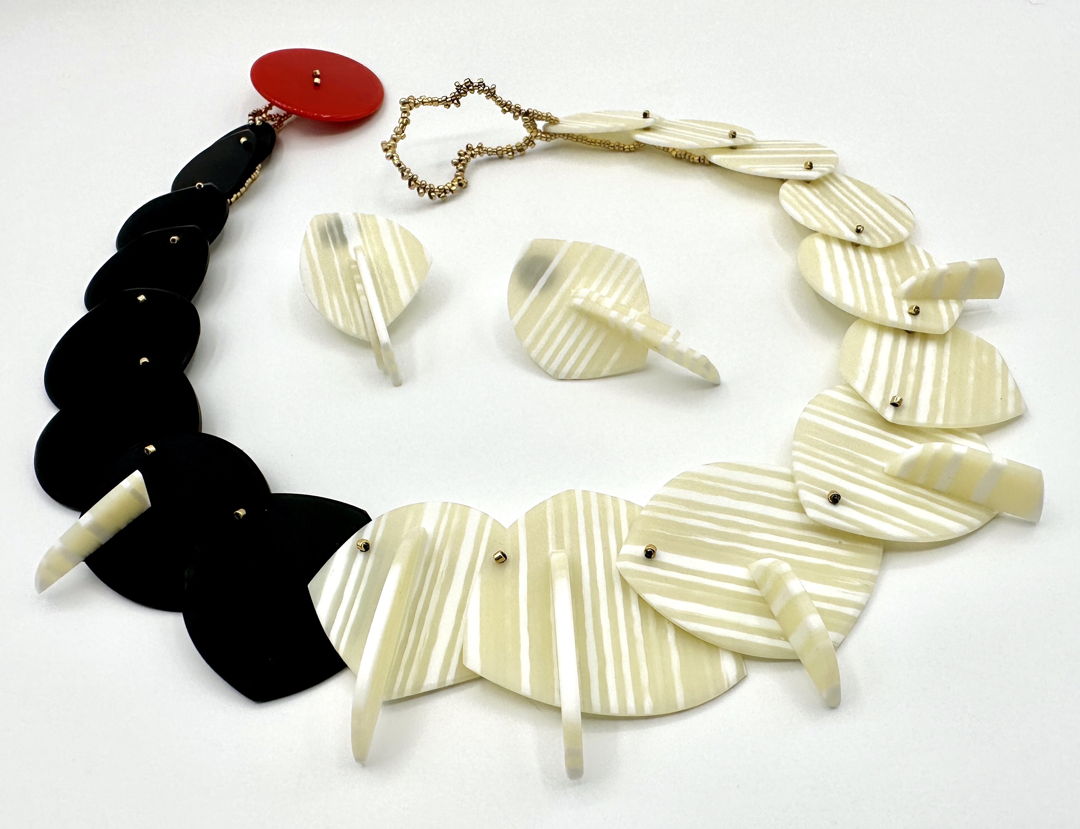 Fused  carved  and sewn glass with glass seed beads