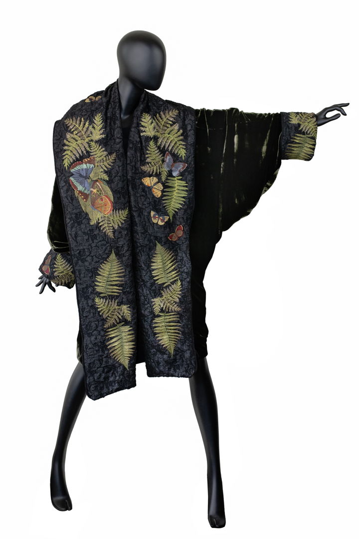 Cocoon coat constructed using mill end and vintage fabrics. Custom embroidery and quote by Jacques Lacarriére (1925-2005) written in English and Arabic calligraphy: "I've known it since childhood but now I can no longer question it: trees speak."
