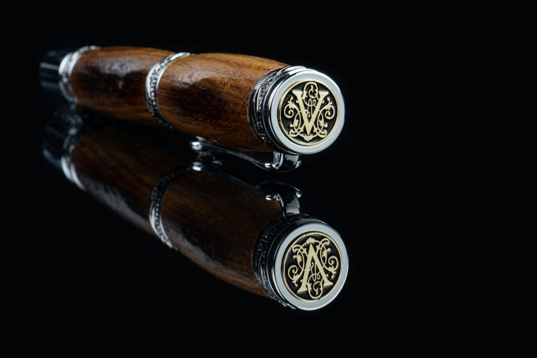 Pen handcrafted of reclaimed wine barrels from the famous Biltmore Estate. This was a custom project to make pens specifically for the estate. Each one has the Vanderbilt insignia on the top of the pen.